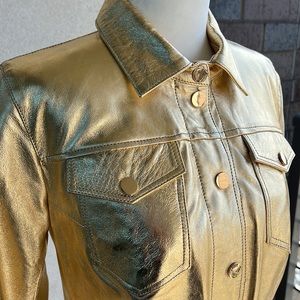 Leather jacket. Gold color. Size 38. Excellent condition.